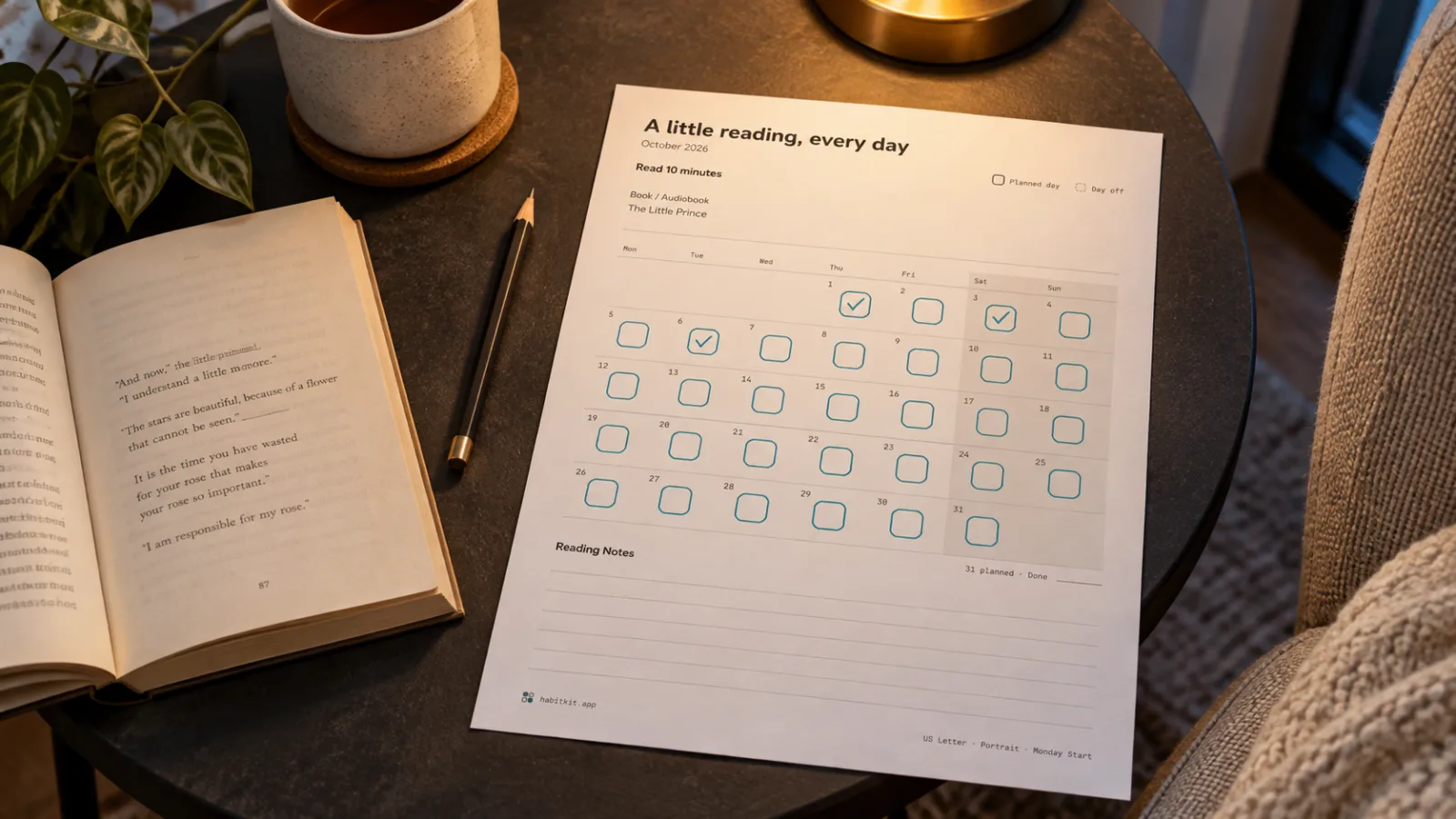 A printed reading calendar on a dark side table beside an open paperback, pencil and mug
